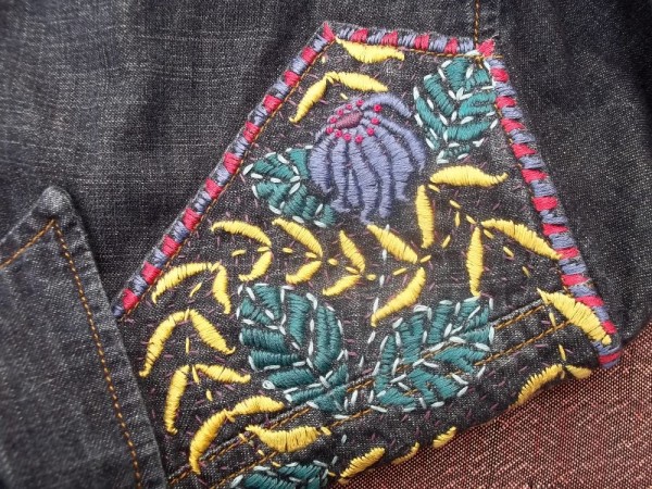 Hand embroidered denim shirt: detail right front yoke