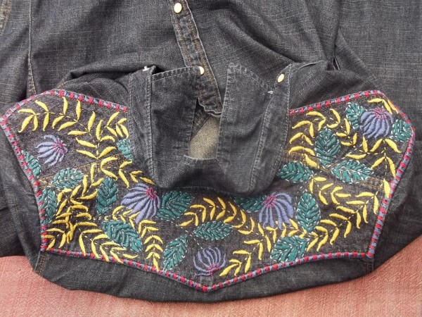 Hand embroidered denim shirt: detail showing yoke flattened out 
