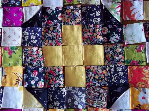 Playing around with patchwork squares as preparation for making an altar frontal 