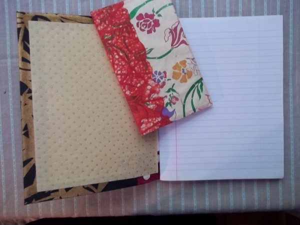 Exercise books covered and lined with Japanese paper