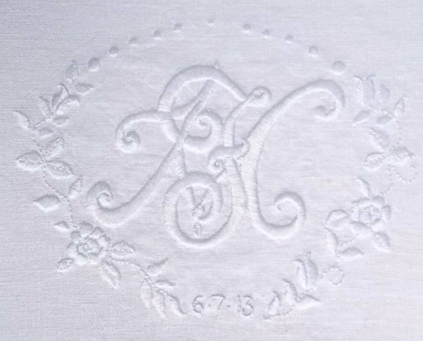 Wedding monogram: F&M hand embroidered with roses on linen