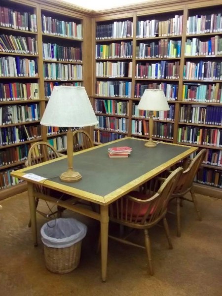 Balliol College Library: a corner of the Readijng Room with old library chairs