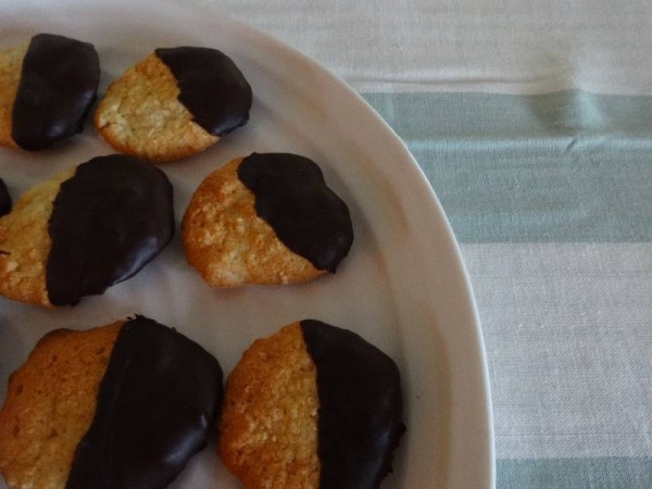 Coconut macaroons, half dipped in dark chocolate (no recipe)