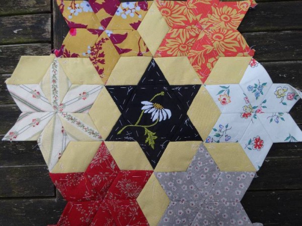 Ipsden Church, Oxon: patchwork altar frontal, detail of ox eye daisy (hand embroidered by Mary Addison)