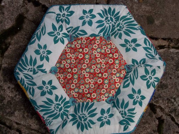 Hexagon patchwork cushion in Vietnamese fabrics