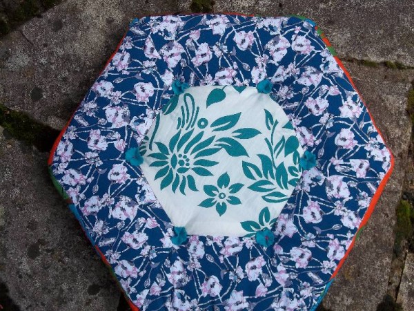 Hexagon patchwork cushion in Vietnamese fabrics