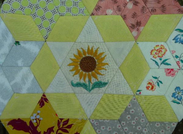 Ipsden Church, Oxon: patchwork altar frontal, detail of sunflower (hand embroidered by Mary Addison)