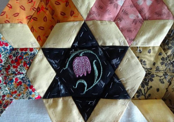 Ipsden Church, Oxon: patchwork altar frontal, detail of snake's head fritillary (hand embroidered by Mary Addison) 