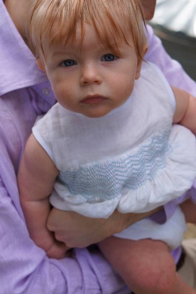 Smocked christening romper: hooray for babies