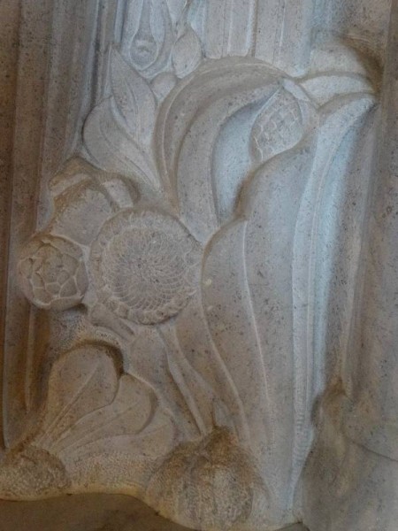 Rothbarth Memorial by Eric Kennington in Checkendon Church: detail showing sunflower.