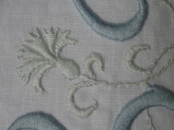 L & P wedding monogram: detail showing cornflower