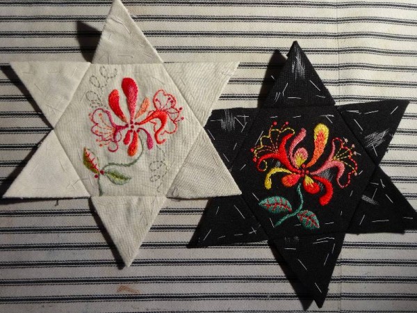 Hand embroidered patchwork stars. Off with the old, on with the new