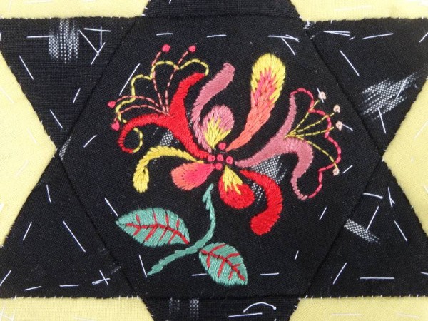 Star patch with hand embroidered honeysuckle (Mary Addison)