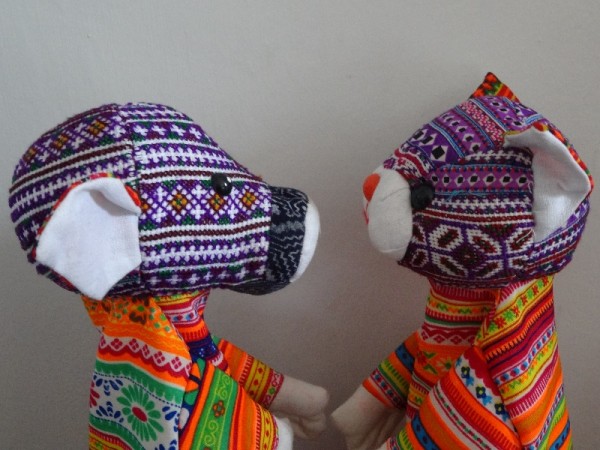 Vietnamese hand puppets made from vintage and new fabric: detail of hand embroidered heads