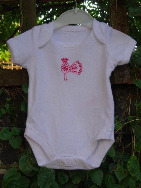 Baby vest with bird (hand embroidered by Mary Addison)