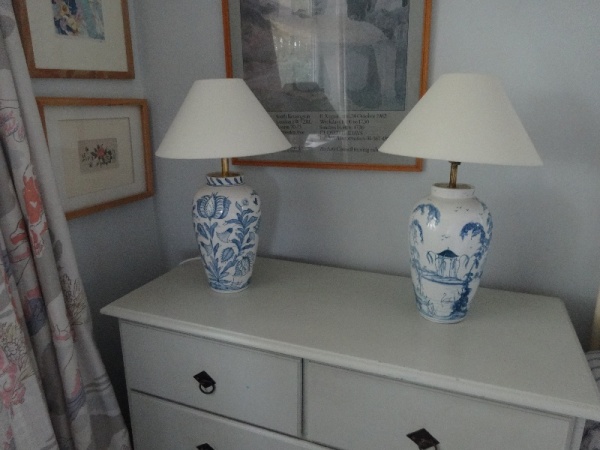 Isis Ceramics wigstand lamps.Tulip on the left and English Garden on the right.