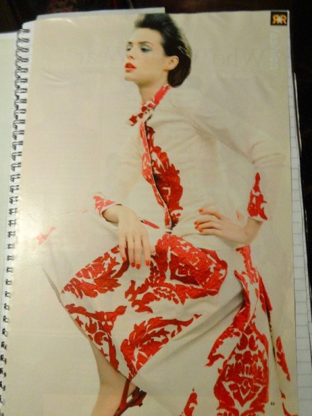 White outfit with roughly appliquéd red fabric 