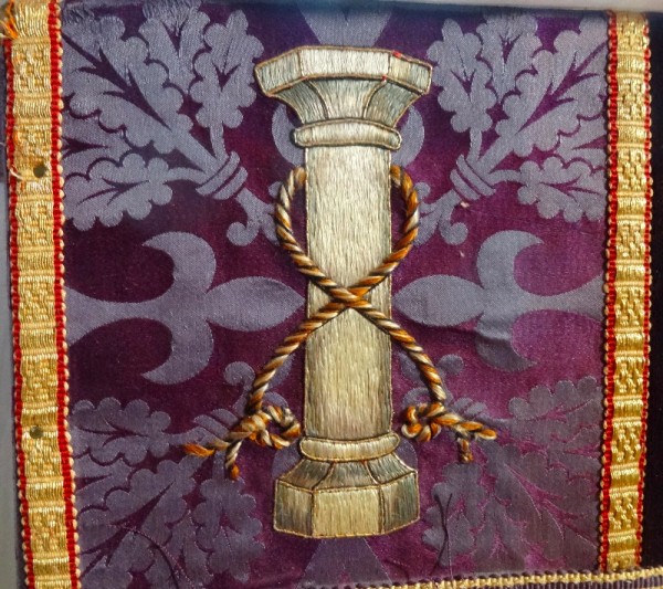 Purple altar frontal: symbols of the crucifixion, pillar and ropes (North Stoke Church, Oxon.)