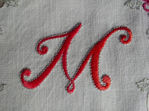 Hand embroidered M (by Mary Addison)