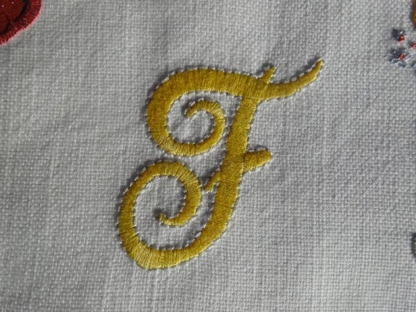 Hand embroidered F (by Mary Addison)