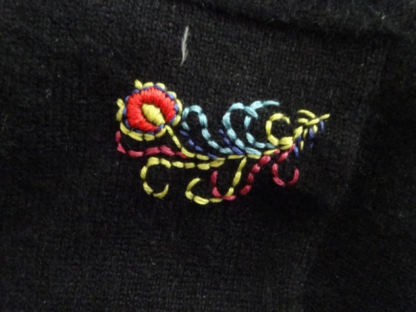 Hand embroidered feather (by Mary Addison)