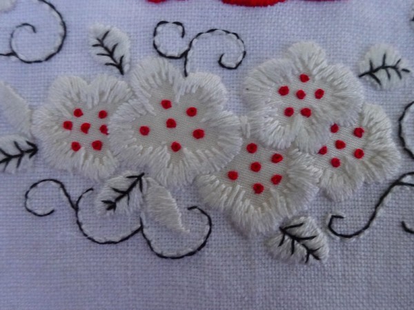 JG monogram: detail of flowers (hand embroidered by Mary Addison)