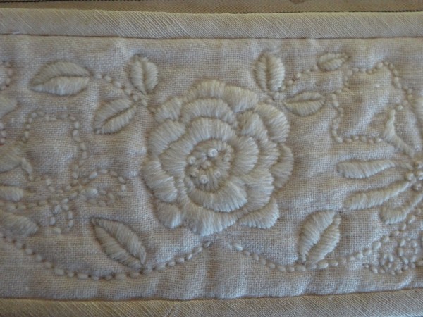 Linen tie back: detail of rose embroidered in tapestry wool (hand embroidered by Mary Addison)