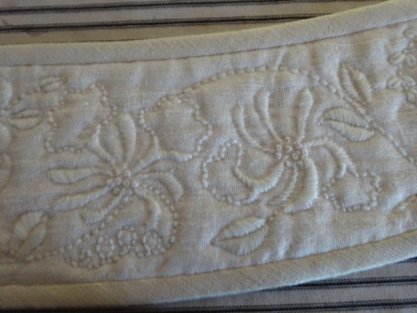 Linen tie back: detail of rose embroidered in tapestry wool (hand embroidered by Mary Addison)