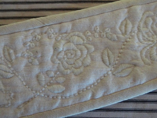 Linen tie back: detail of rose embroidered in tapestry wool (hand embroidered by Mary Addison)