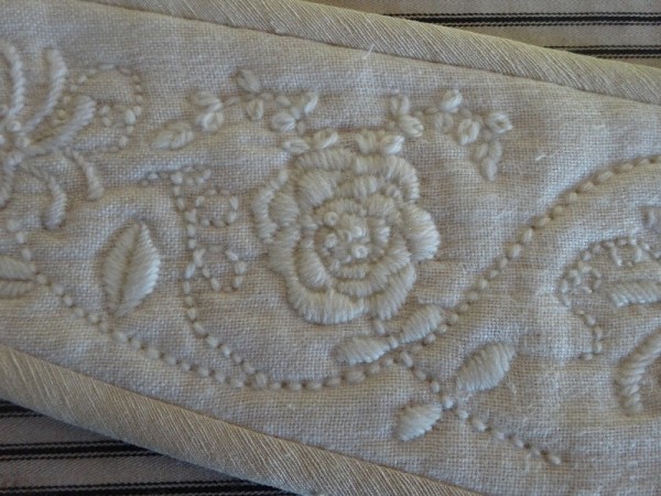 Linen tie back: detail of rose embroidered in tapestry wool (hand embroidered by Mary Addison)
