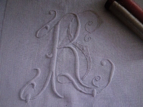 Vintage monogram embroidered on linen