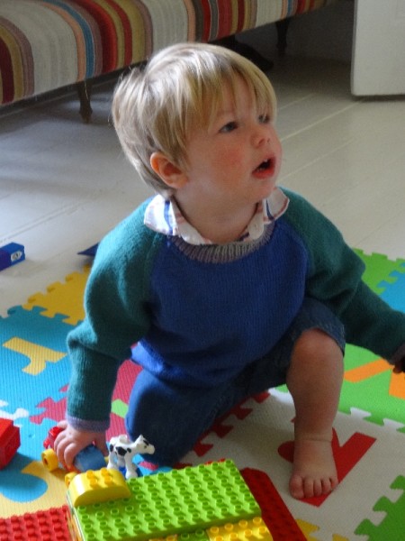 Little boy in Debbie Bliss pattern for 2 colour raglan jumper