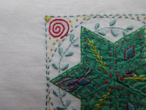 Embellished patchwork star : detail (hand embroidered by Mary Addison)