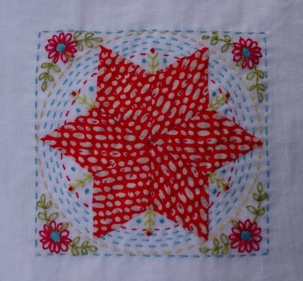 Fourth embellished patchwork star (hand embroidered by Mary Addison)