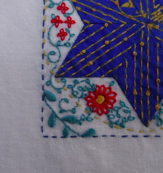Embellished patchwork star : detail (hand embroidered by Mary Addison)
