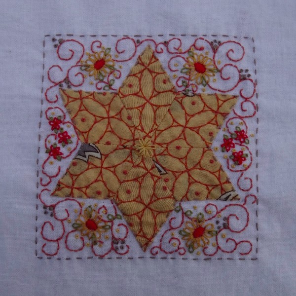 Fourth embellished patchwork star (hand embroidered by Mary Addison)