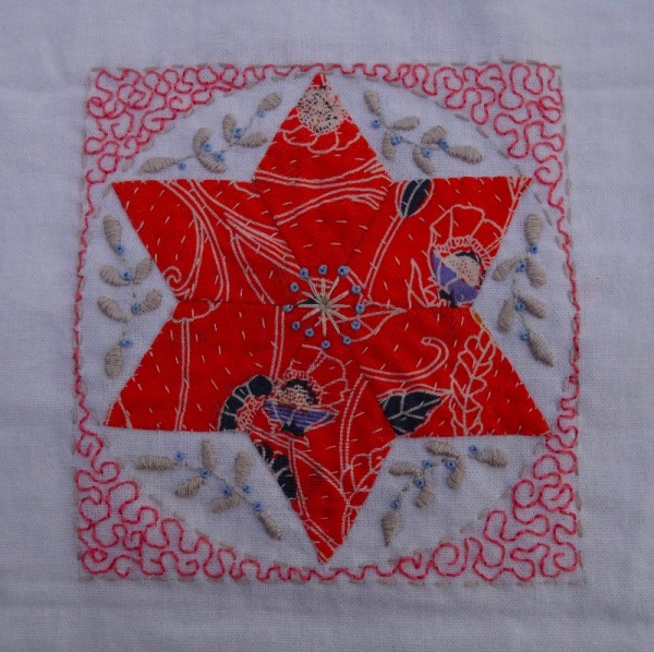 Thirteenth  embellished patchwork star (hand embroidered by Mary Addison)
