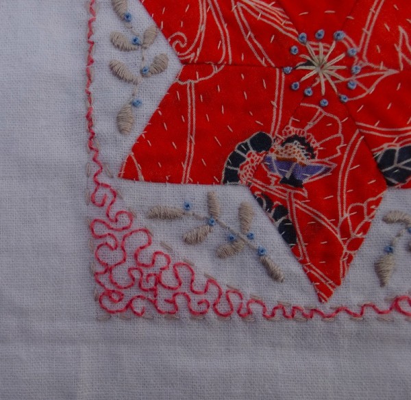 Detail of thirteenth embellished patchwork star (hand embroidered by Mary Addison)