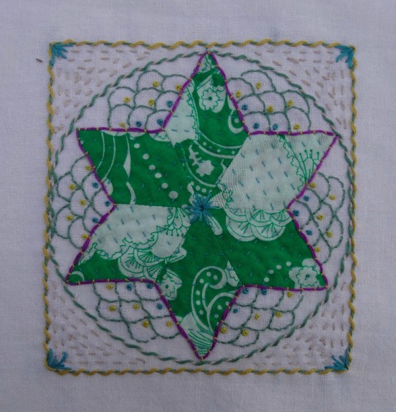 Twelfth embellished patchwork star (hand embroidered by Mary Addison)