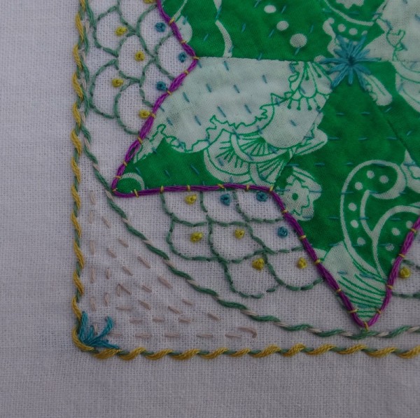 Detail of  twelfth embellished patchwork star (hand embroidered by Mary Addison)